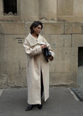 Long creamy transformer coat